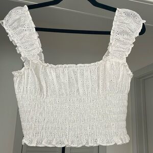 Reformation eyelet peasant top